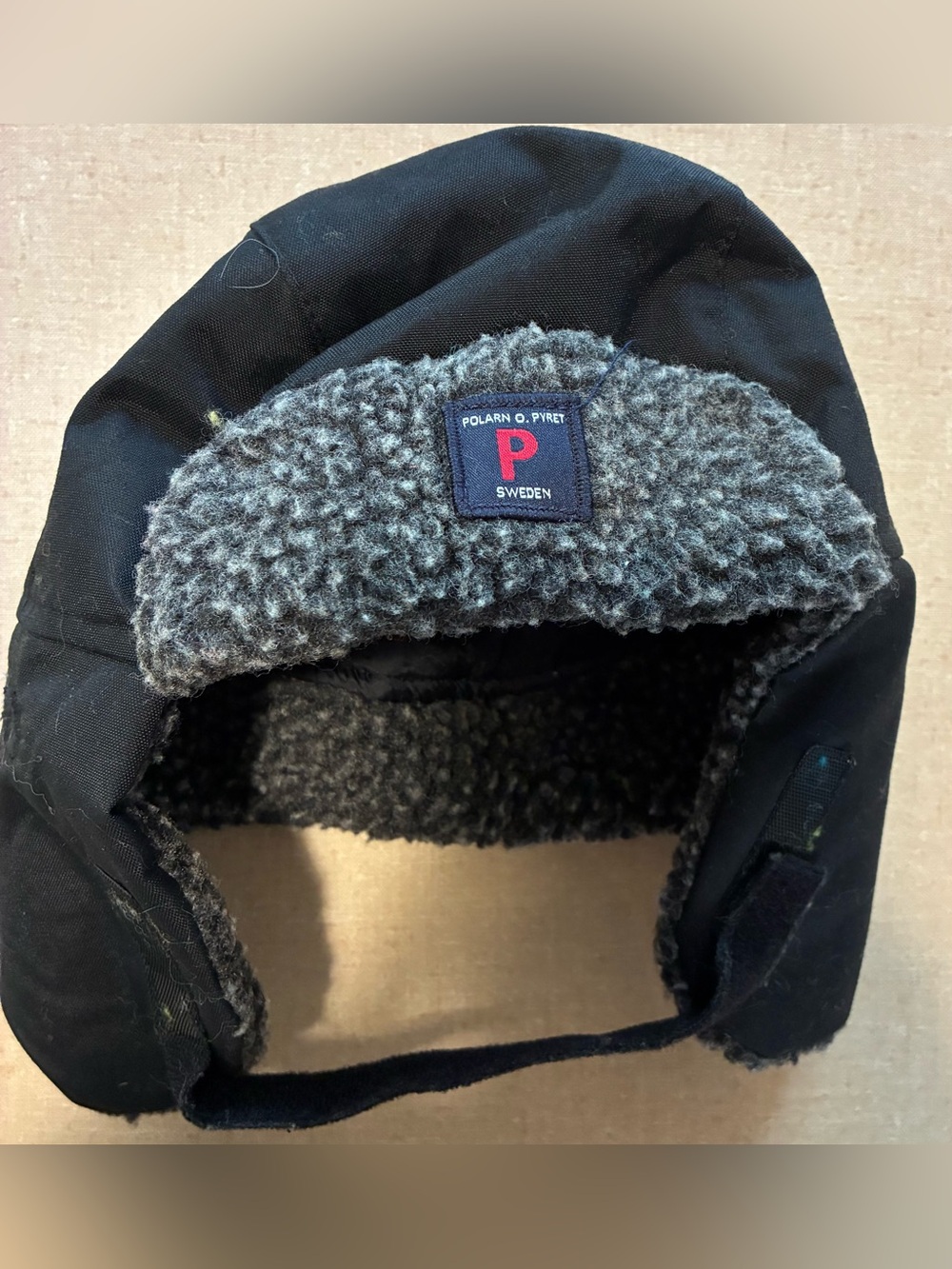 Polarn O. Pyret Black Trapper Hat with Gray Sherpa Lining